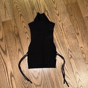 Black, turtle neck with side slit (shows side boob)